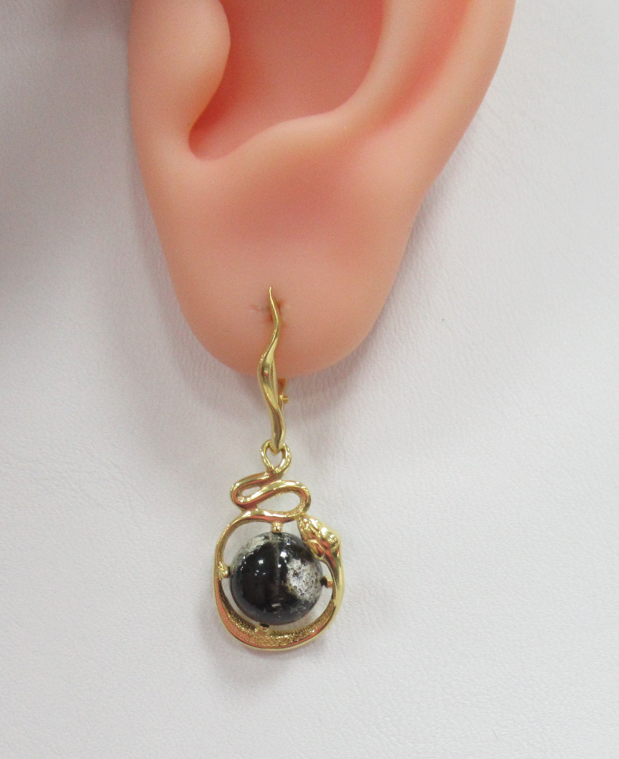 Серебряные серьги с янтарем "Змеи"